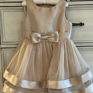 Formal Champaign colored dress size 4. Worn only once is in excellent condition.